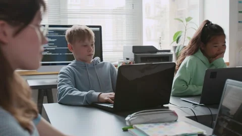 Group of Focused Children Using Laptops During Programming Lesson Stock Footage 317641307