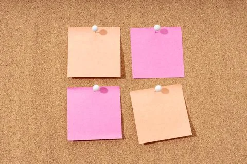 Group of four Blank note on a cork board for adding text and push pin. Mock u Stock Photos