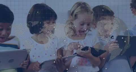 Group of four kids tapping screens in tech workshop, activating animated map Stock Footage 329511774