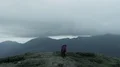 The group of four people standing on a mountain top 4k or 4k+ Resolution