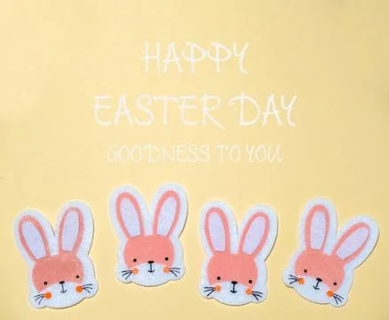 Group of four rabbits with a message of Goodness to you written below them Stock Photos