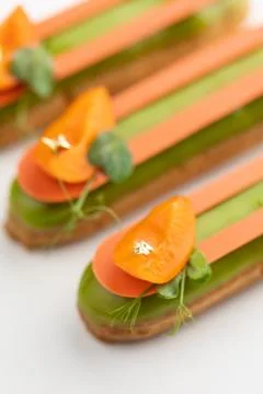 Group of french dessert Eclair on white background Stock Photos