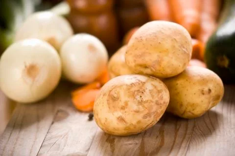 Group of fresh potatoes on the  table Stockfoto's