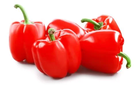 A group of fresh raw red bell peppers. Healthy vegetable food isolated on a.. Fotos Stock