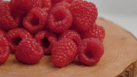 Group of fresh red raspberry  on wood Stock Footage 143713152