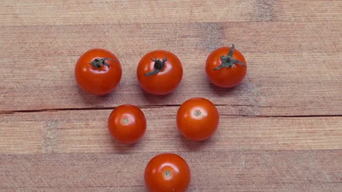 A group of fresh ripe cherry tomatoes. Stock Footage 210233609