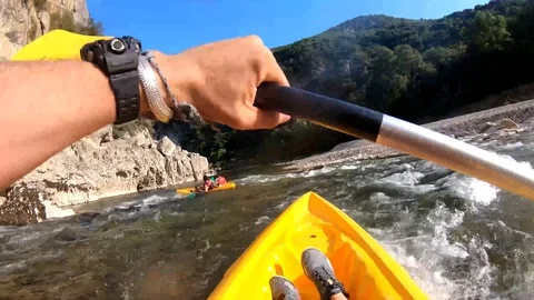 Group of friend canoeing in river Stock Footage 127840819