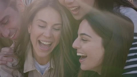 Group friend taking selfie sharing cheerful moments looking laughing at cell Stock Footage 273000774