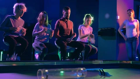 Group of friends at the amusement arcade Stock Footage 213445102