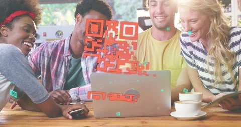 A group of friends are using a laptop in a cafe while enjoying cup of coffee Stock Footage 328709617