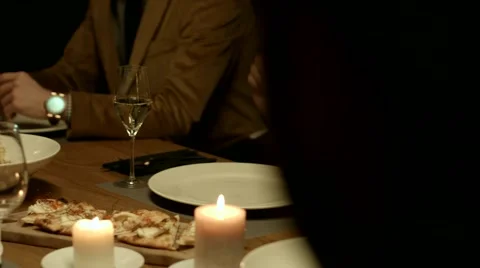 Group of friends attending a dinner party. Stock Footage 61157960