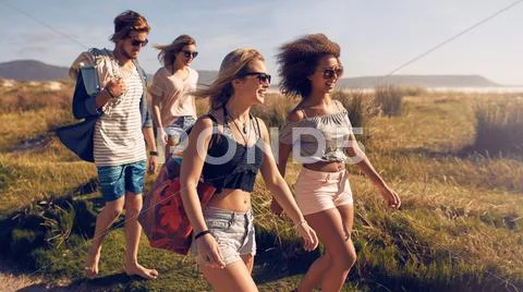 Group of friends on beach vacation Stock Photos