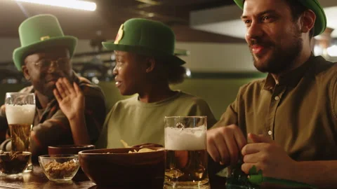 Group of Friends Celebrating Saint Patricks Day in Pub Stock Footage 290449573