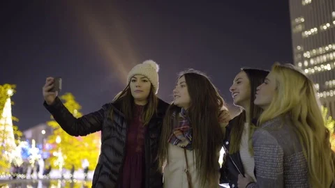 Group Of Friends Enjoy Taking Selfies For Night Out Downtown, Salt Lake City Stock Footage