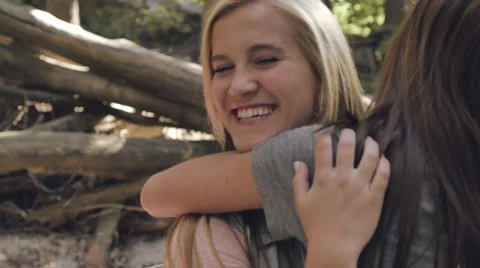 Group Of Friends Greet Each Other At Campsite, Give Big Hugs And Smile Stock Footage