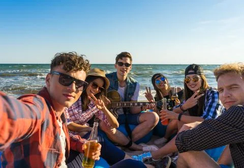 Group of friends having fun at the beach Stock Photos