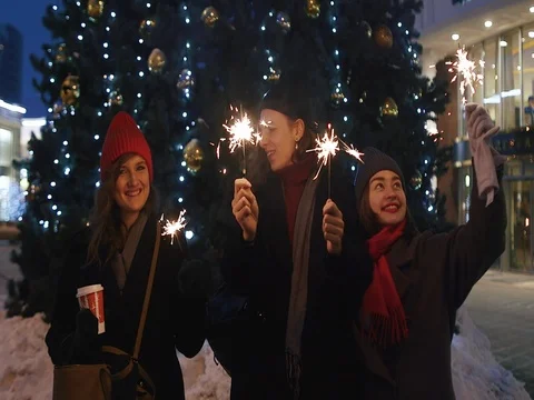 Group of friends having fun with sparklers Stock Footage 72533040