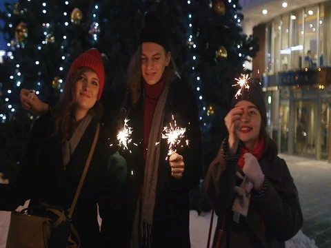 Group of friends having fun with sparklers Stock Footage 72533527