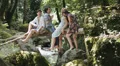 group of friends having fun at the stream - laugh and happy HD Footage