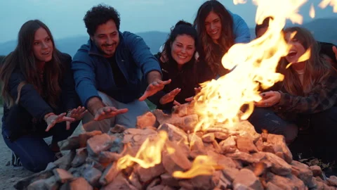 Group of friends having fun together at night party around bonfire - Friendship Stock Footage 224682301