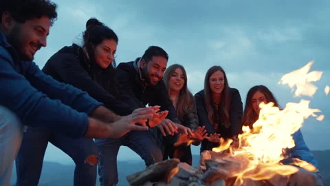 Group of friends having fun together at night party around bonfire - Friendship Stock Footage 224684855