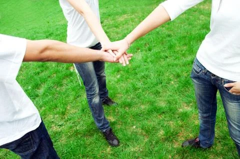 Group of friends joining hands. unity, teamwork concept Stock-Fotos