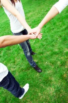 Group of friends joining hands. unity, teamwork concept 스톡 사진