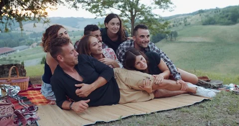 Group of friends making faces during the pic nic. shot in slow motion Stock Footage 93074125