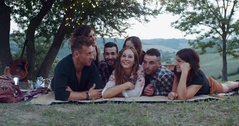 Group of friends making faces during the pic nic. shot in slow motion Stock Footage 93074733