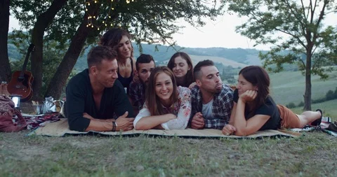 Group of friends making faces during the pic nic. shot in slow m Stock Footage 93075738