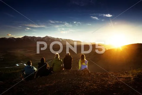 Group of friends on mountains background Stock Photos