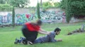 group of friends playing in the park - jump - tikle - lift - fun HD Footage