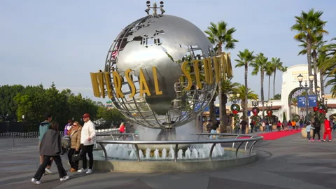 Group of Friends Posing by Universal Studios Globe in Los Angeles Video stock 297118743