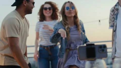 Group of friends recording dances at mobile phone Stock-Footage 203998319