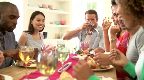 Group Of Friends Sitting Around Table Having Dinner Party Stock Footage 40428720