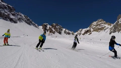 Group of friends skiing in the mountains of the alps Video stock 106934977