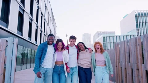 Group of Friends Smiling and Waving at the Camera Outdoors Stock Footage 296024733