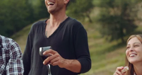 Group of friends spending time making a picnic and a barbeque. shot in slow moti Stock Footage 92471003