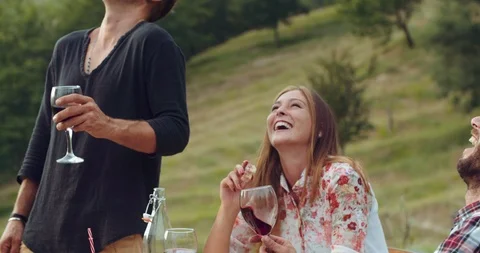 Group of friends spending time making a picnic and a barbeque. shot in slow moti Stock Footage 92471206