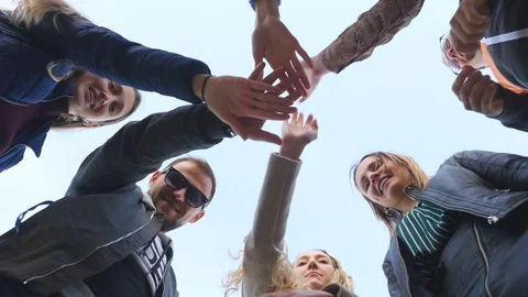 Group of friends standing in circle Stock Footage 130011866