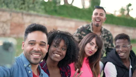 Group of friends taking a selfie with a mobile Stock Footage 222361476