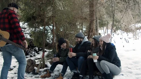 Group of friends of tourists talking in the forest Stock Footage 123522241