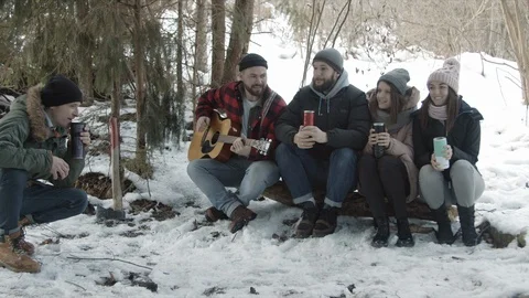 Group of friends of tourists talking in the forest Stock-Footage 123522407