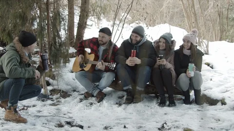 Group of friends of tourists talking in the forest Stock Footage 123522549