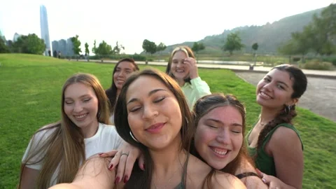 A group of friends trying to take a selfie through Stock Footage 146236355