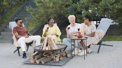 A group of friends from various countries enjoys a delightful afternoon together Video stock 283259035