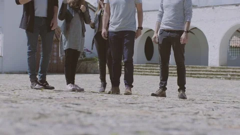 Group of friends walking towards camera Stock Footage 71798816