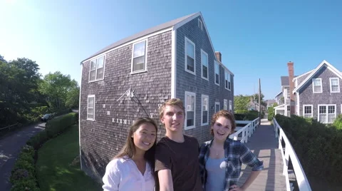 Group Of Fun Teens Use A Gopro Stick To Take Vacation Selfies Stock-Footage 57659108