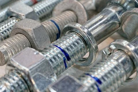 Group of galvanized screw-bolts with nuts and washers Stock Photos