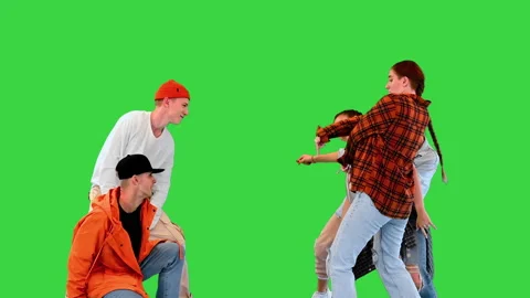 Group of girls dancing vs two boys on a Green Screen, Chroma Key. 스톡 동영상 218100687